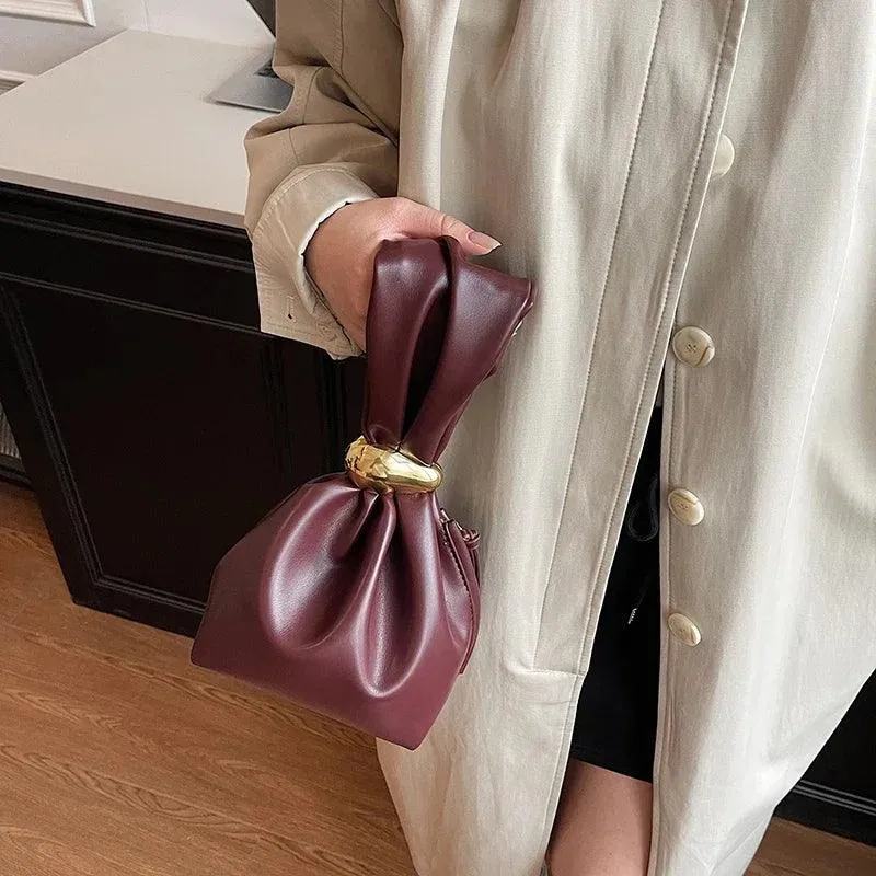 Mini Bow Tie Pouch Bag Wrist Handle Leather Zipper Tote Purse