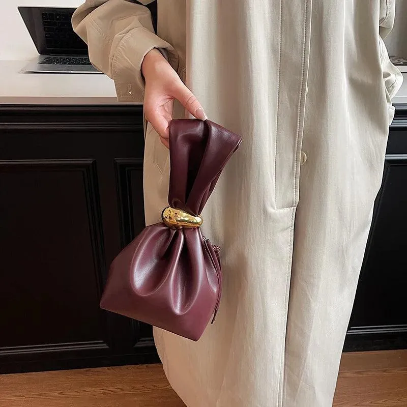 Mini Bow Tie Pouch Bag Wrist Handle Leather Zipper Tote Purse