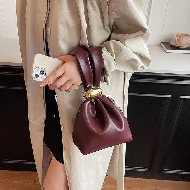 Mini Bow Tie Pouch Bag Wrist Handle Leather Zipper Tote Purse