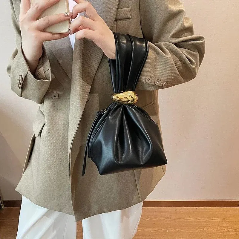Mini Bow Tie Pouch Bag Wrist Handle Leather Zipper Tote Purse