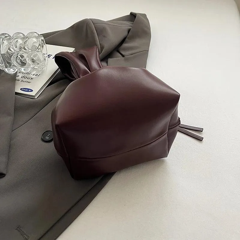 Mini Bow Tie Pouch Bag Wrist Handle Leather Zipper Tote Purse