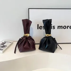 Mini Bow Tie Pouch Bag Wrist Handle Leather Zipper Tote Purse
