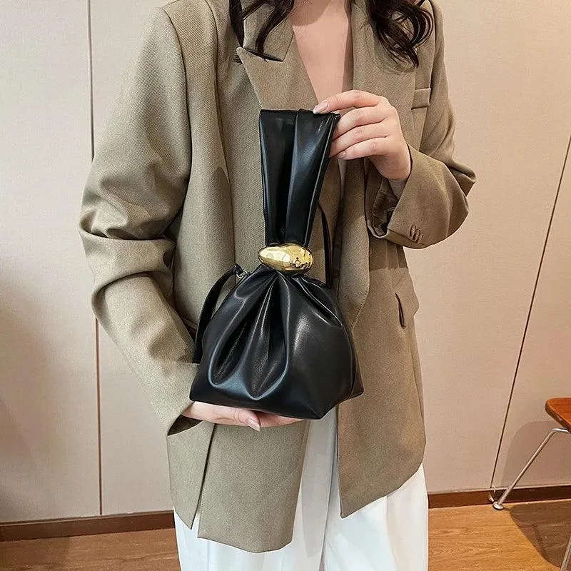 Mini Bow Tie Pouch Bag Wrist Handle Leather Zipper Tote Purse