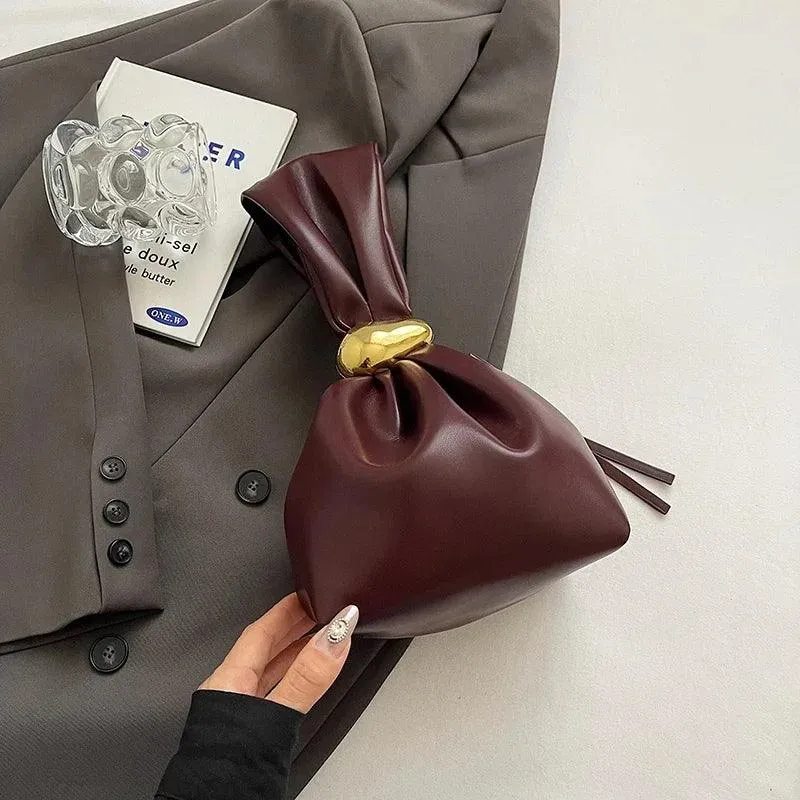 Mini Bow Tie Pouch Bag Wrist Handle Leather Zipper Tote Purse