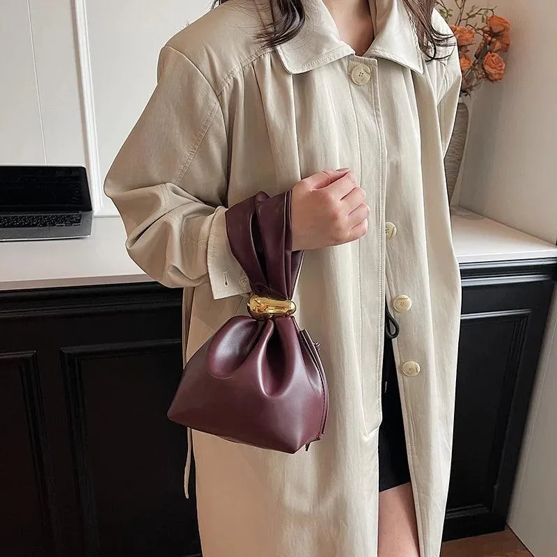 Mini Bow Tie Pouch Bag Wrist Handle Leather Zipper Tote Purse