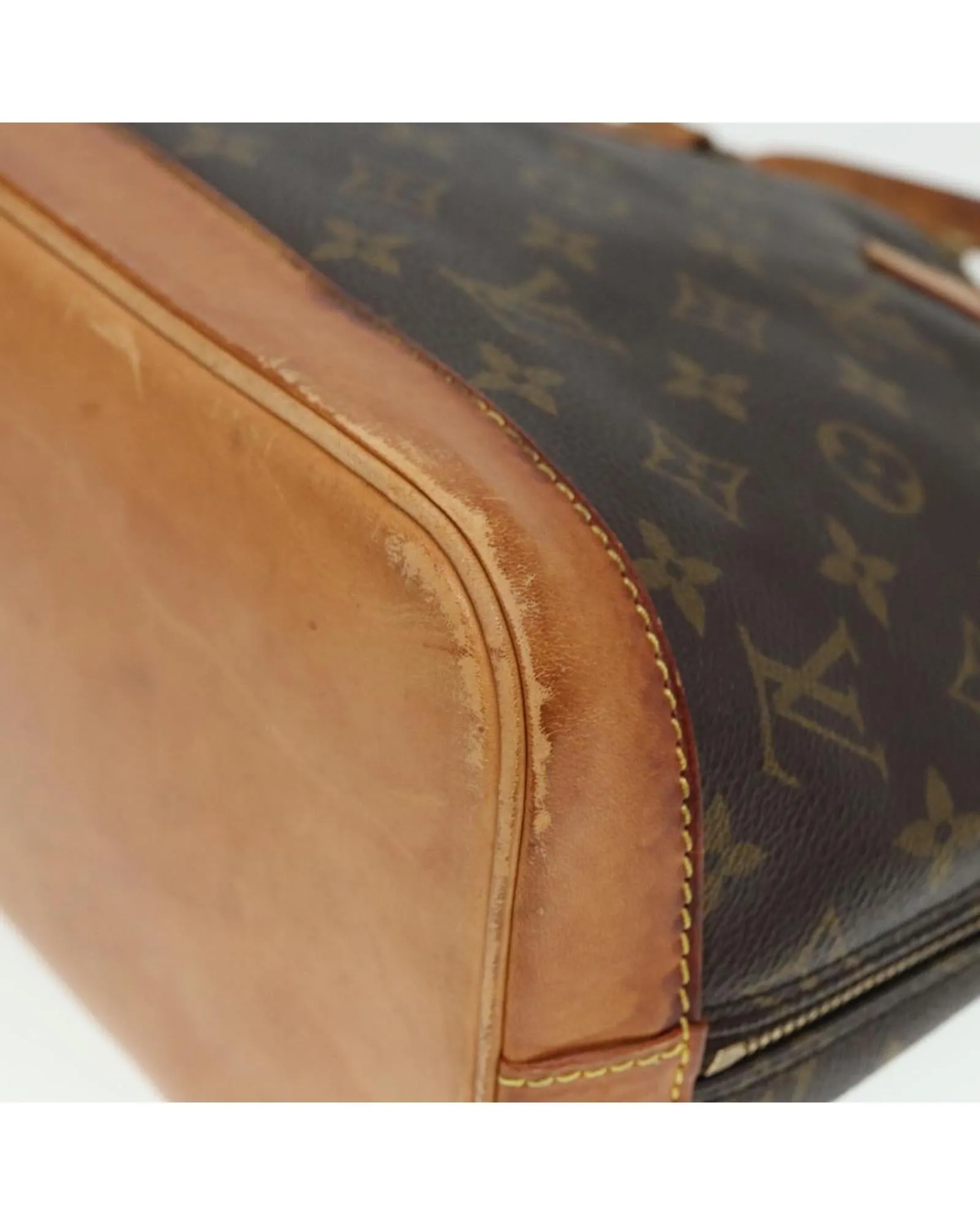 Monogram Canvas Alma Handbag with Classic Design