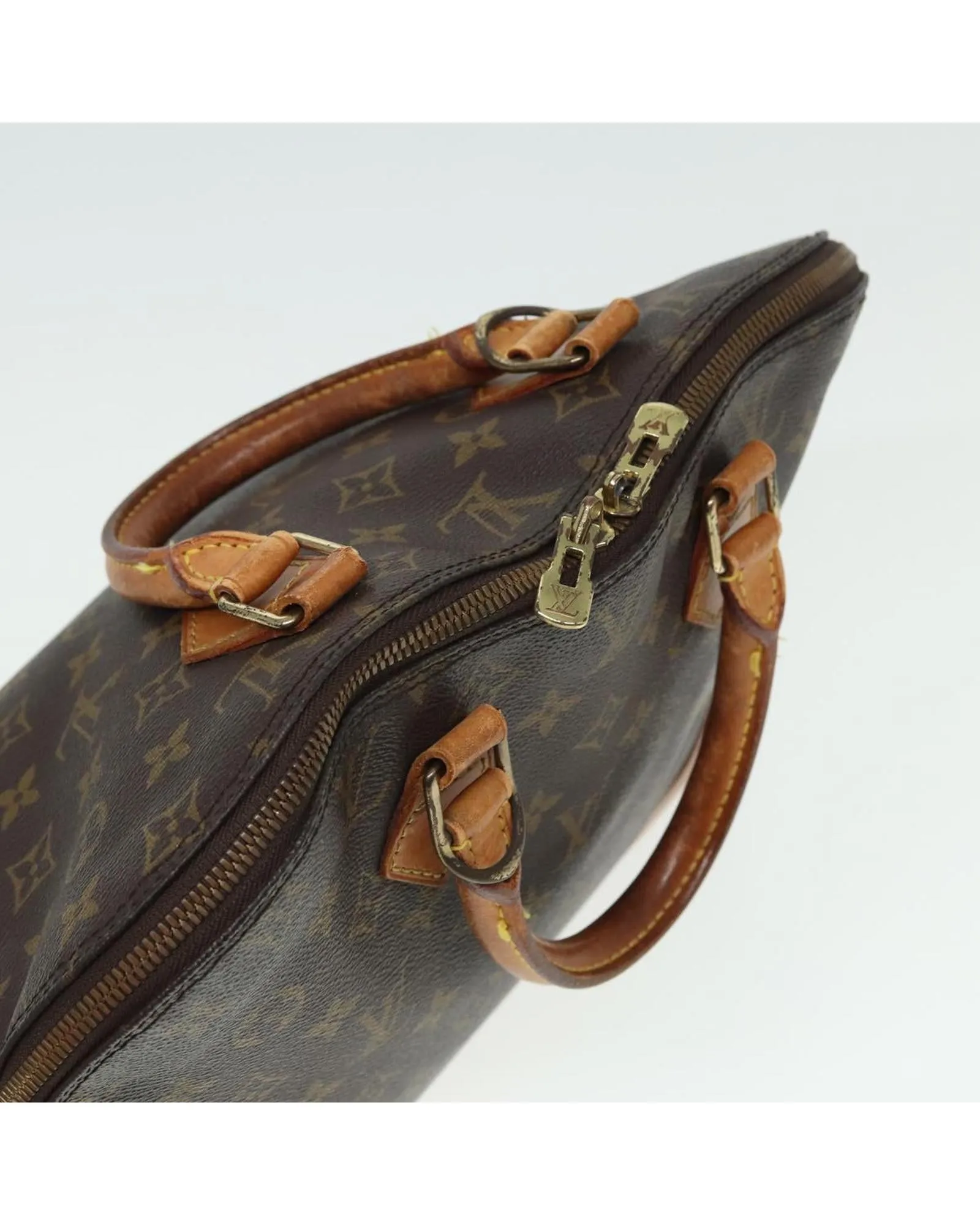Monogram Canvas Alma Handbag with Classic Design