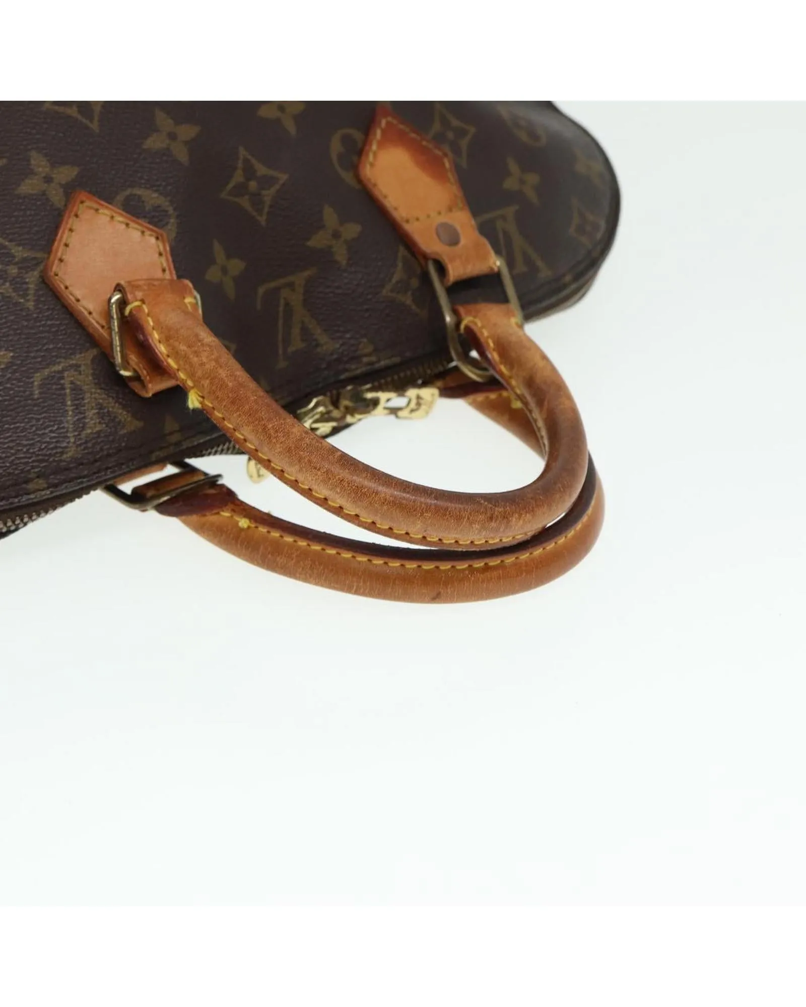 Monogram Canvas Alma Handbag with Classic Design