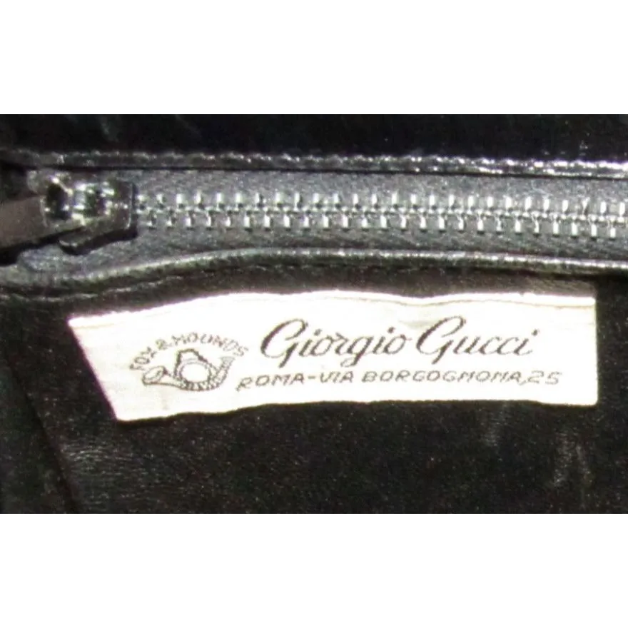 Rare 60s, mod, Giorgio Gucci, black leather, satchel style shoulder bag with a snap hinged top, two heavy gold chain shoulder straps