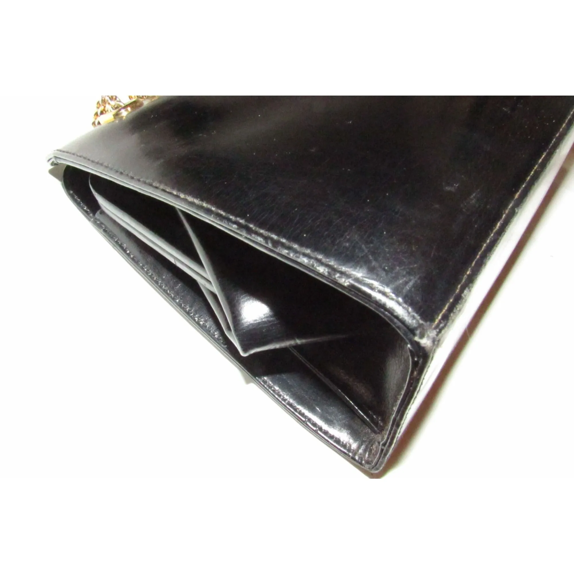 Rare 60s, mod, Giorgio Gucci, black leather, satchel style shoulder bag with a snap hinged top, two heavy gold chain shoulder straps