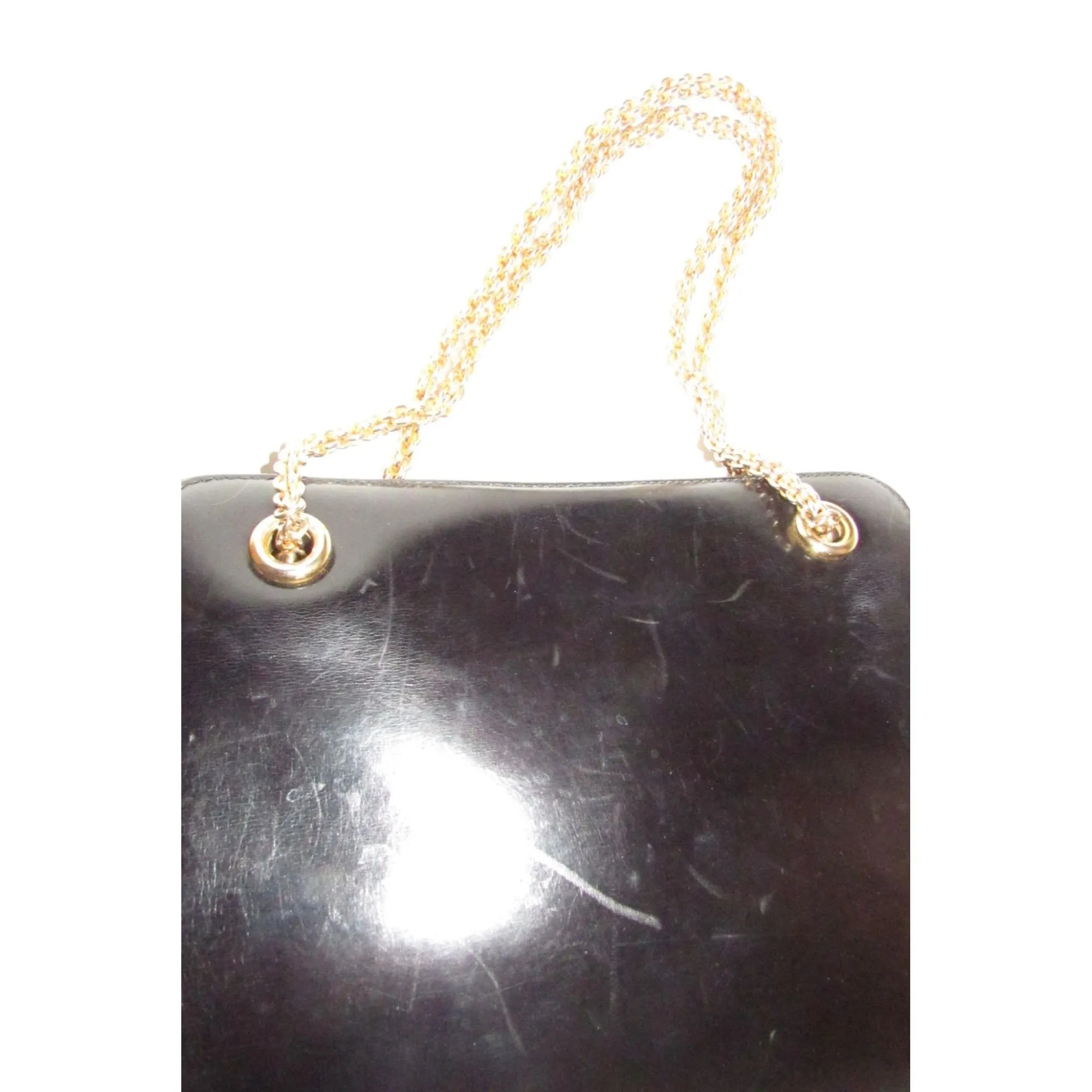 Rare 60s, mod, Giorgio Gucci, black leather, satchel style shoulder bag with a snap hinged top, two heavy gold chain shoulder straps