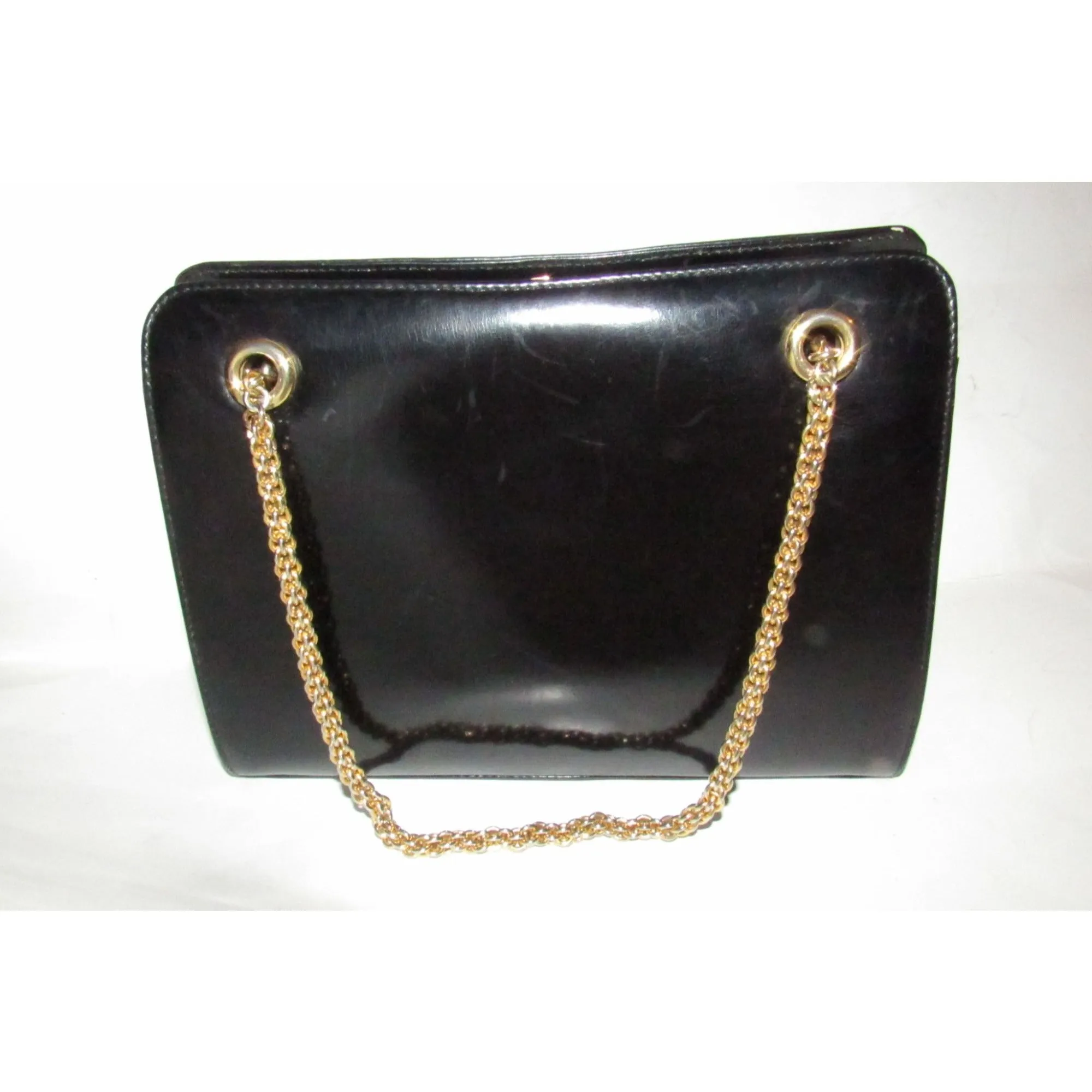 Rare 60s, mod, Giorgio Gucci, black leather, satchel style shoulder bag with a snap hinged top, two heavy gold chain shoulder straps