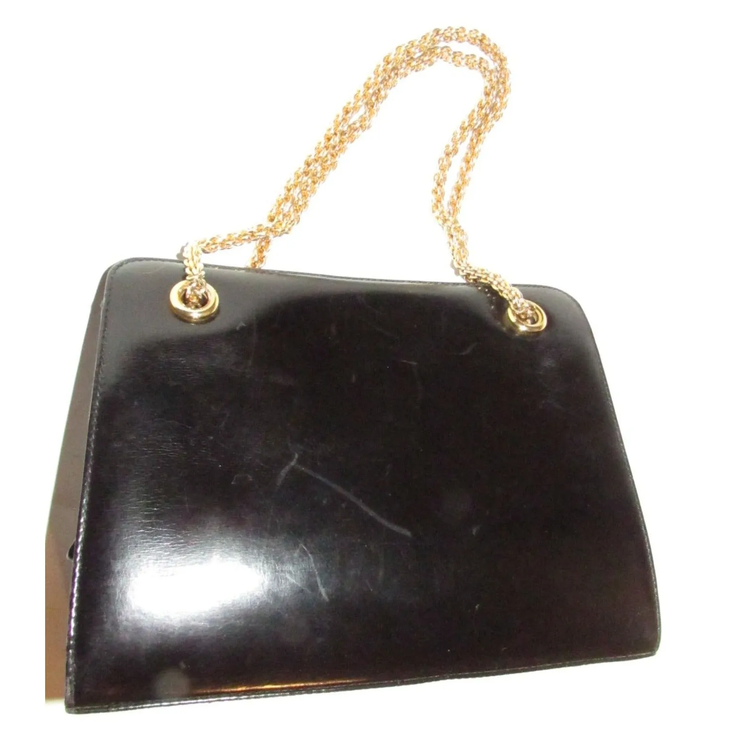 Rare 60s, mod, Giorgio Gucci, black leather, satchel style shoulder bag with a snap hinged top, two heavy gold chain shoulder straps