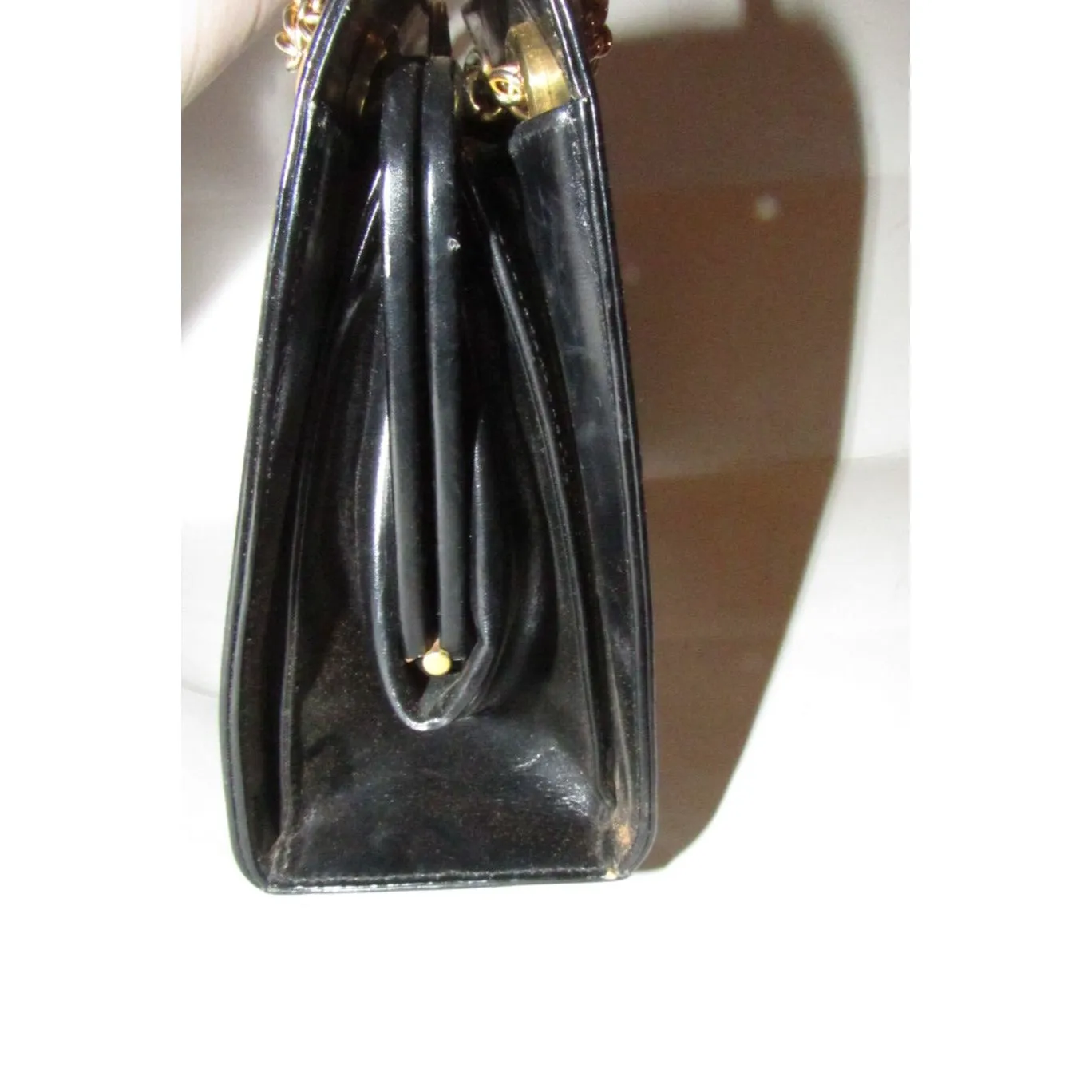 Rare 60s, mod, Giorgio Gucci, black leather, satchel style shoulder bag with a snap hinged top, two heavy gold chain shoulder straps
