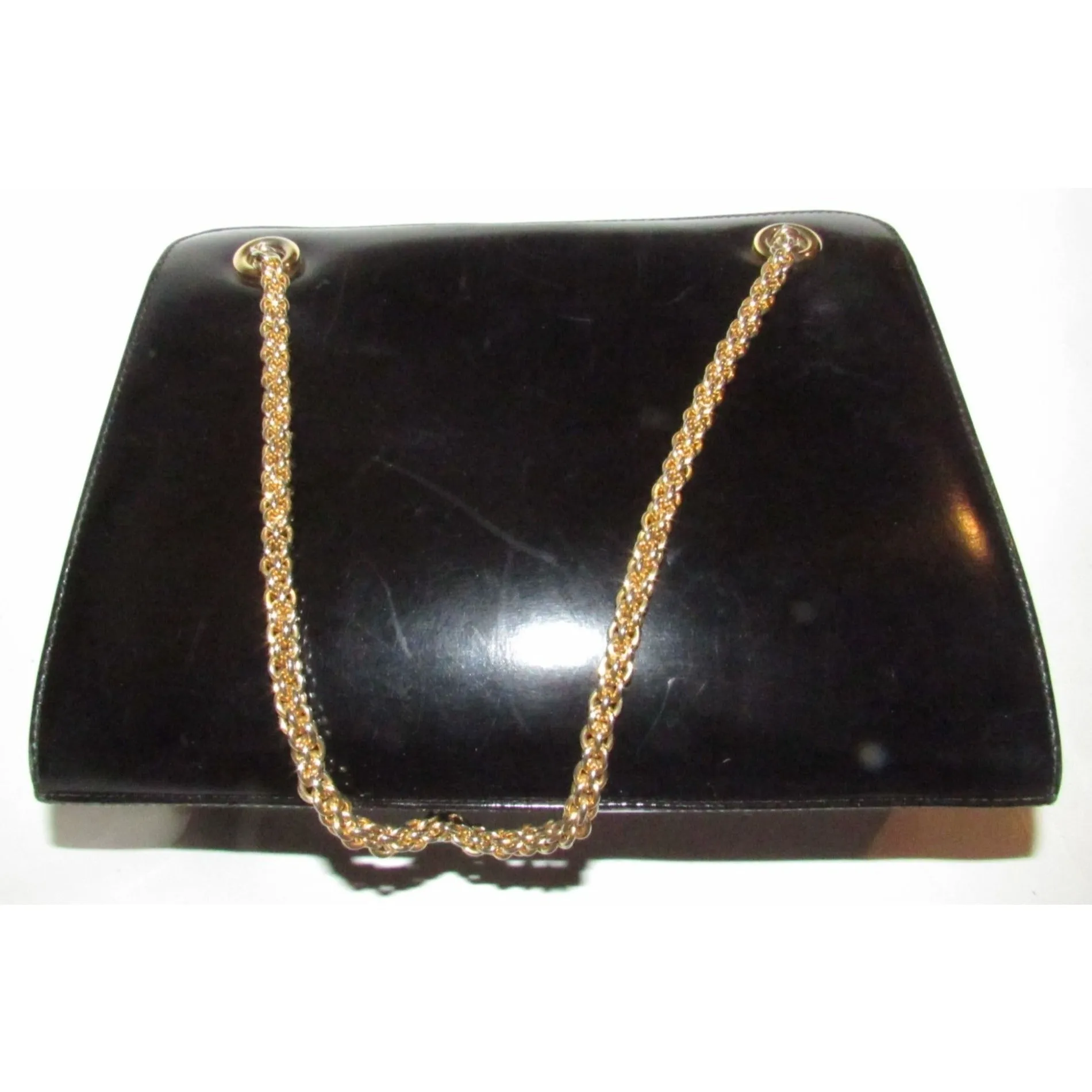 Rare 60s, mod, Giorgio Gucci, black leather, satchel style shoulder bag with a snap hinged top, two heavy gold chain shoulder straps
