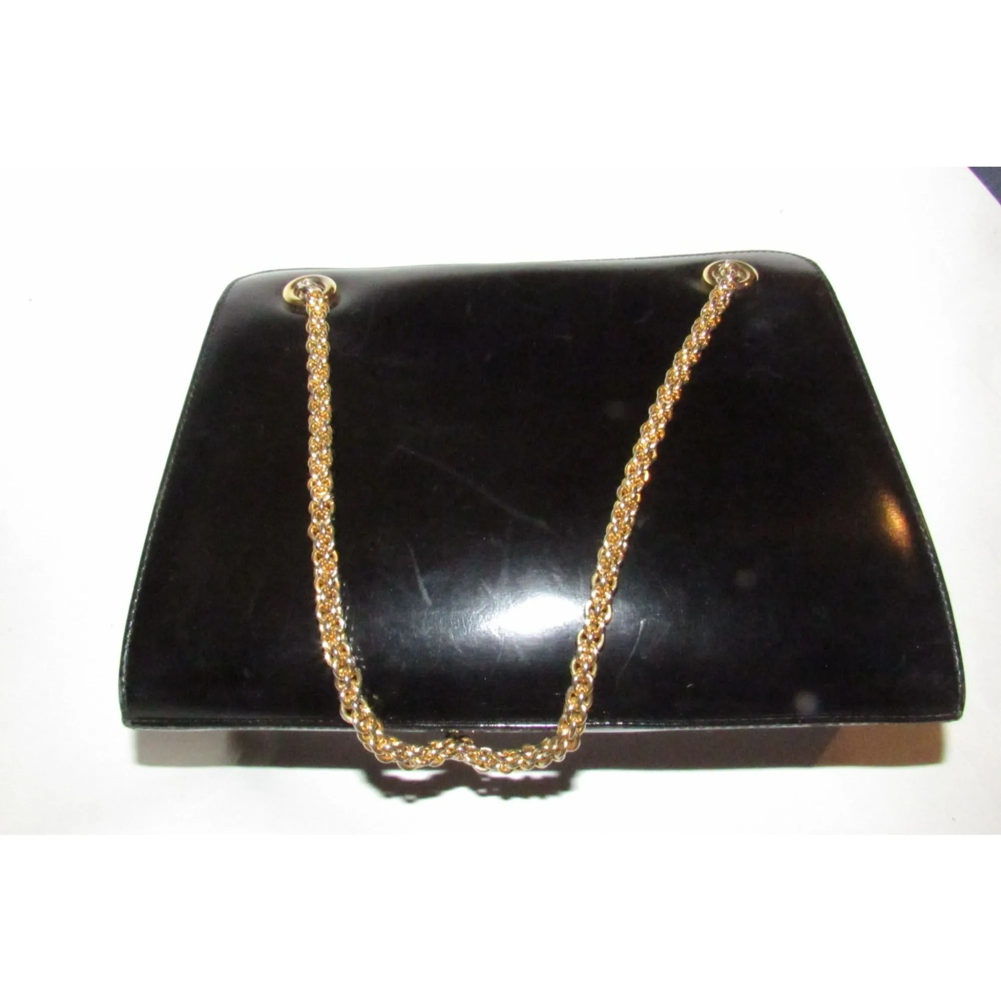 Rare 60s, mod, Giorgio Gucci, black leather, satchel style shoulder bag with a snap hinged top, two heavy gold chain shoulder straps
